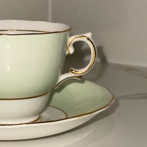 Elegant Mint Green Teacup and Saucer with Gold Trim